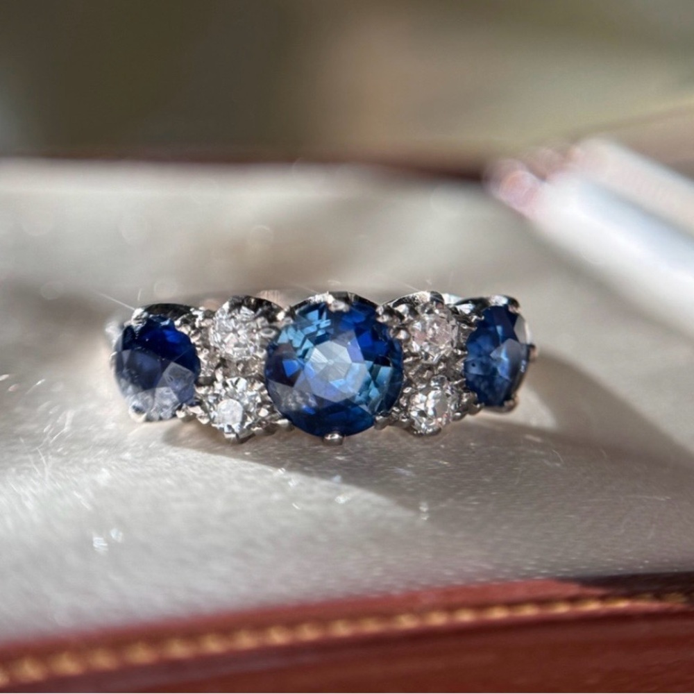 Beautiful Edwardian Style Natural Sapphire and Diamond Ring set in 18K band.